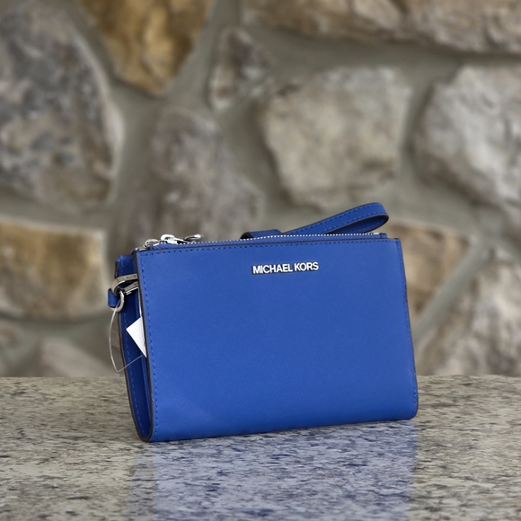 Michael Kors Handbags - Michael Kors Jet Set Blue Double Zip Wristlet